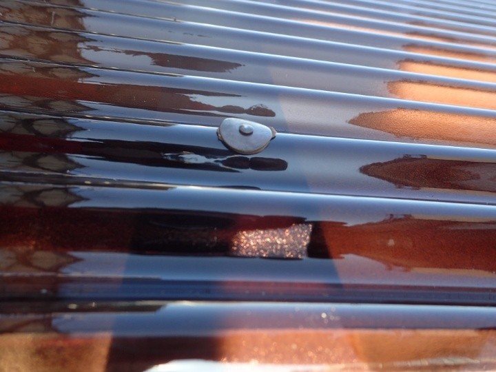 フックボルトとパッキンによる固定